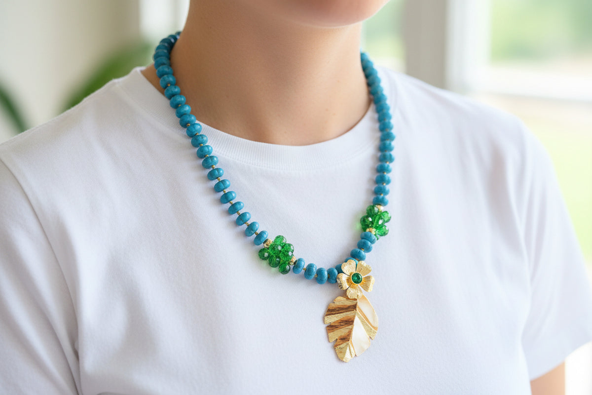 Turquoise Beaded Statement Necklace with Gold Flower & Leaf Pendant