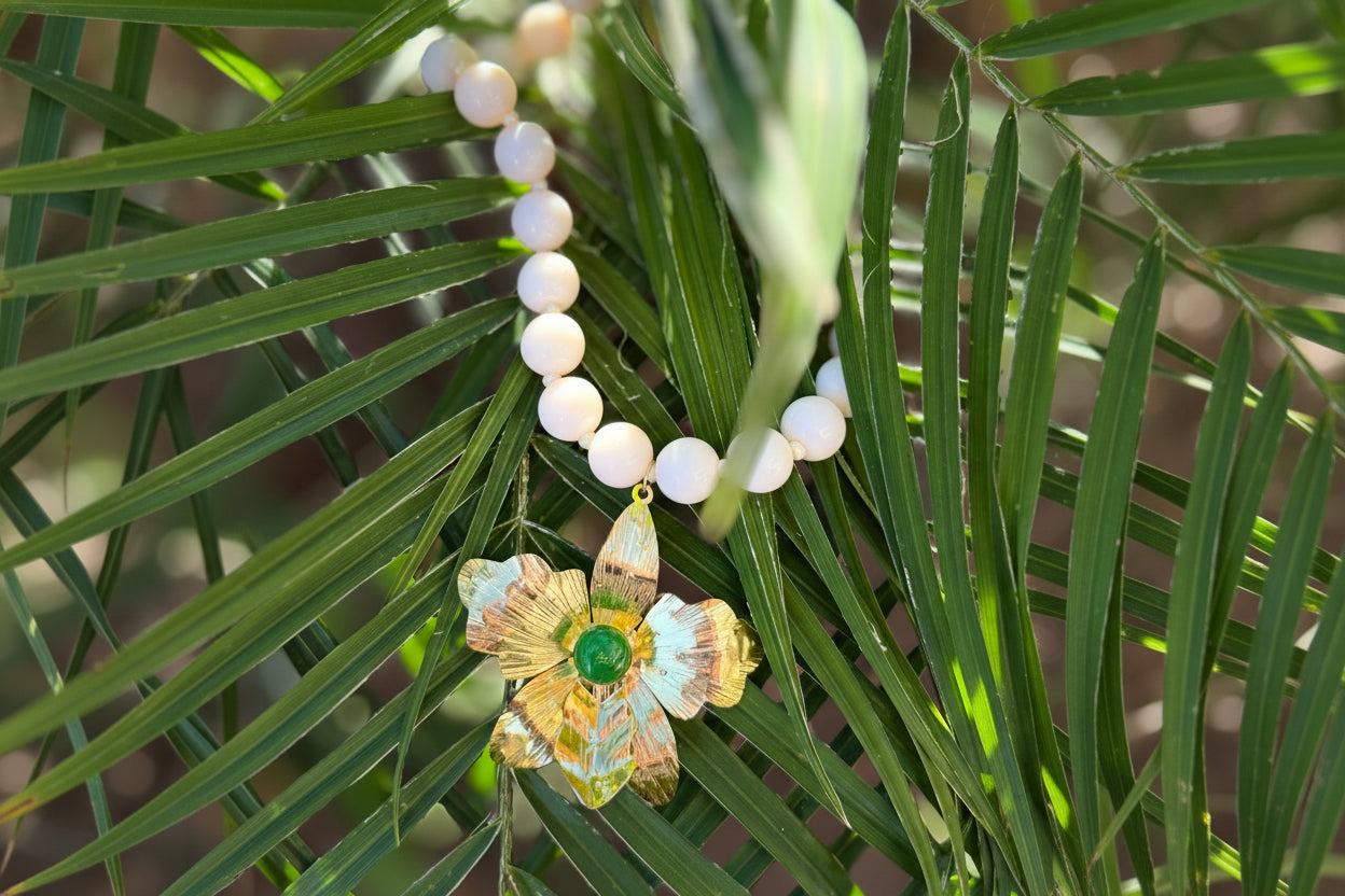 White Beaded Necklace with Handcrafted Gold Flower Pendant – Artisan Statement Jewelry