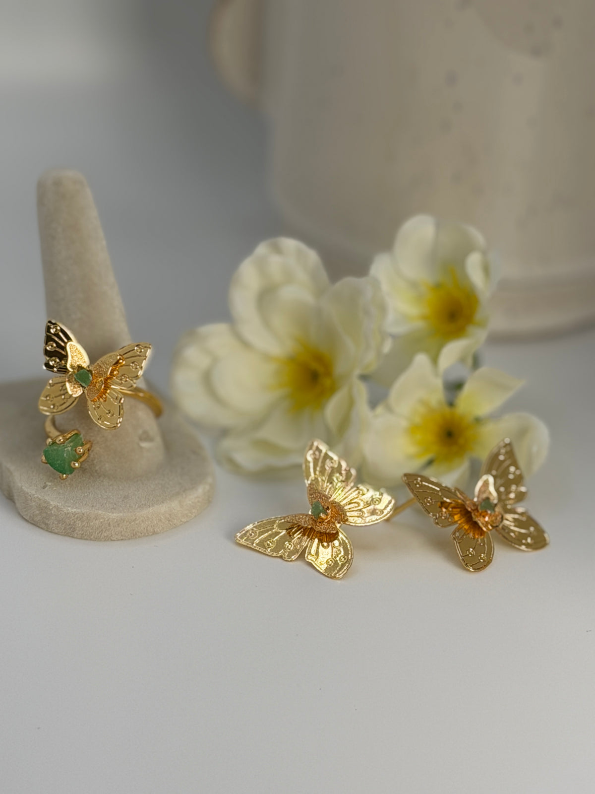 Handcrafted butterfly jewelry set in 24K gold plated bronze
Featuring natural raw emerald stones.
Elegant, delicate, and one of a kind.